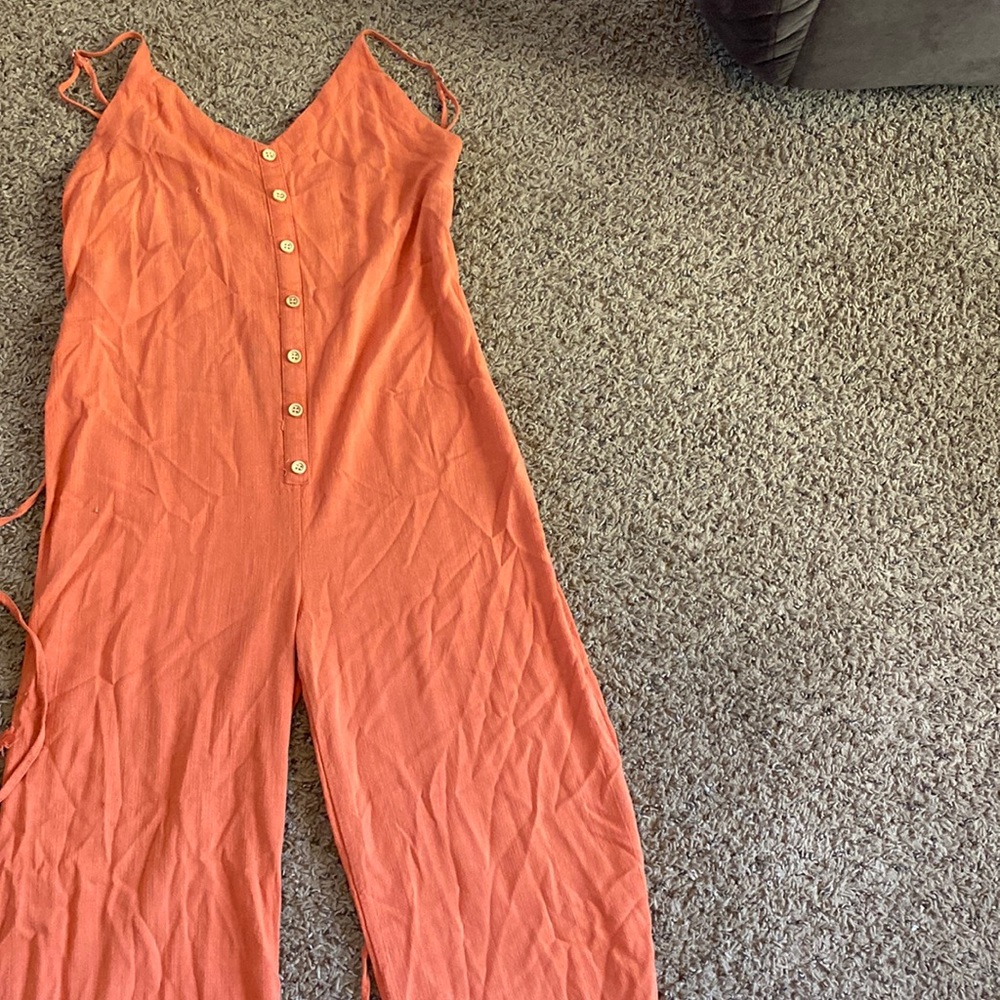 Orange Dillard’s romper, strapless buttons down torso